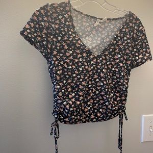 Sky and Sparrow black floral v-neck crop top.